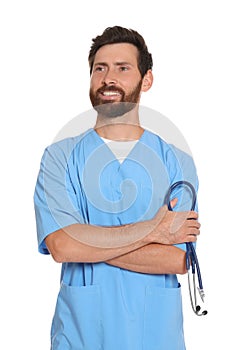 Portrait of doctor in scrubs with with stethoscope on white background
