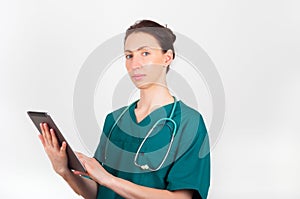 Portrait of doctor, surgeon, nurse with stethoscope and tablet