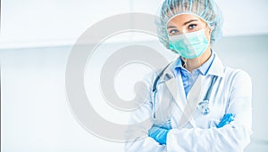 Portrait of doctor woman surgeon specialist in sterile clothing