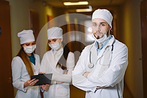 Portrait of doctors in the corridor of the hospital.