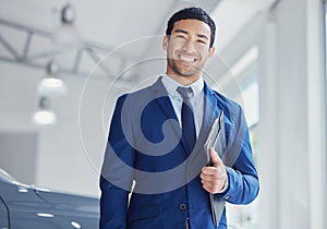 Portrait, documents and car salesman smile at dealership, workshop or workplace. Face, folder and male person at