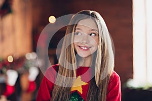 Portrait of dreamy young positive girl teenager spend time home alone looking interested plans for christmas night