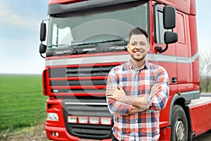 Portrait of driver at modern truck