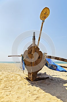 Portrait eastern catarmaran and paddle