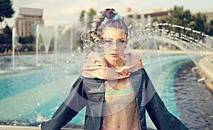 Portrait of an edgy woman - Fashionable girl on urban background