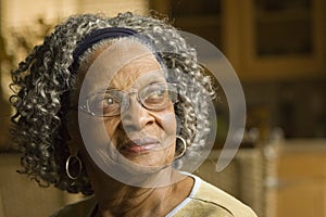 Portrait of an elderly African American woman at home.