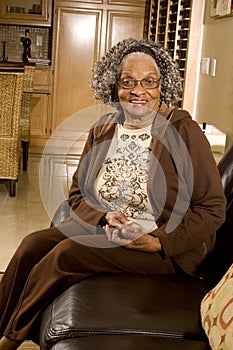 Portrait of an elderly African American woman at home.