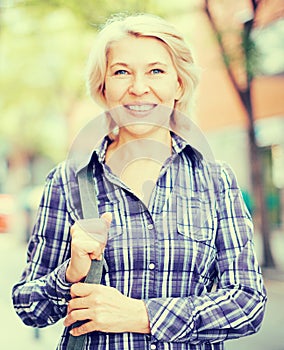 Portrait of elderly blonde woman