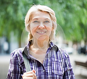 Portrait of elderly blonde woman