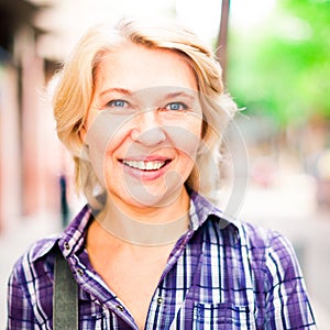 Portrait of elderly blonde woman