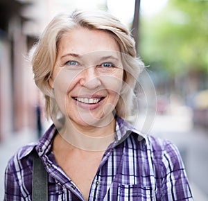 Portrait of  elderly blonde woman