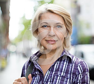 Portrait of  elderly blonde woman