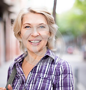 Portrait of  elderly blonde woman