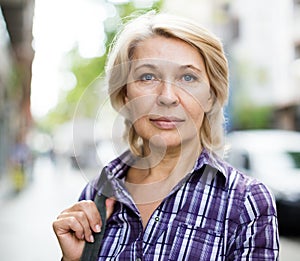 Portrait of  elderly blonde woman