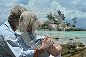 Portrait of elderly couple on a beach