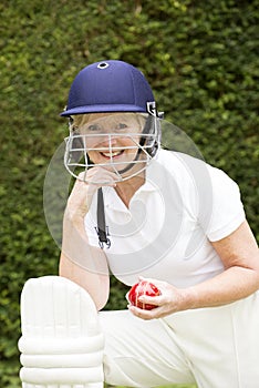 Portrait of an elderly female cricketer
