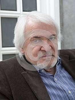 Portrait of elderly man with eye disease