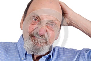Portrait of elderly man thinking on something