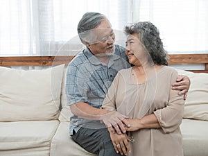 Portrait of elderly senior asian couple happy together at home