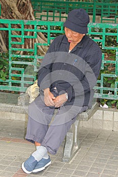 Portrait of a sleeping old man at the Tin Hau temple,Hongkong,China