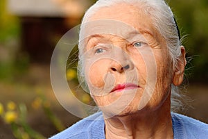 Portrait of the elderly woman