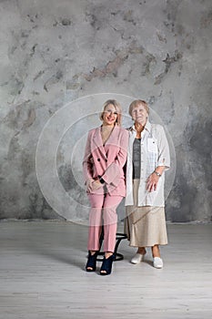 Portrait of elderly woman with her granddaughter