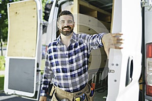 Portrait of an electrician happy worker at work