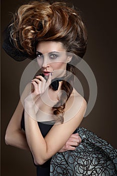 portrait of elegant brown-haired with a big hairstyle