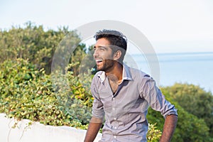 Portrait of elegant Indian man in formal shirt outdoor