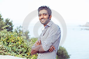 Portrait of elegant Indian man in formal shirt outdoor