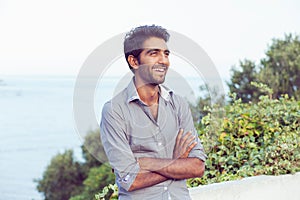 Portrait of elegant Indian man in formal shirt outdoor