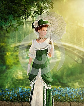 Portrait of an elegant Jane Austen style woman  stroling in a park