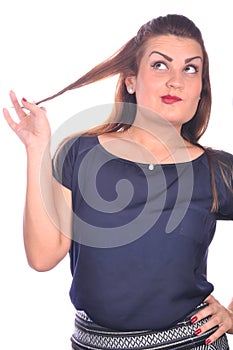 Portrait of elegant woman touchin her hair