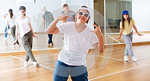 Teenage girl hip hop dancer during class