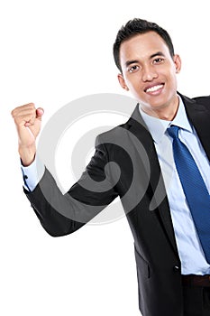 Portrait of a energetic young business man enjoying success