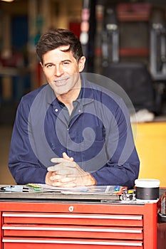 Portrait Of Engineer Standing In Factory