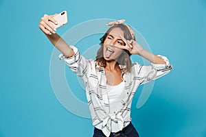 Portrait of european cute woman 20s wearing headband smiling and