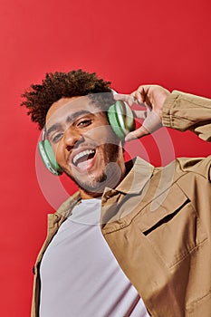 portrait of excited african american fella photo