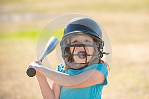 Portrait of excited amazed kid baseball player wearing helmet and hold baseball bat. Funny kids sports face.