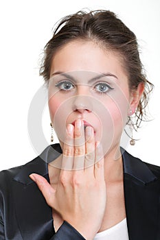 Portrait of excited business woman covering her mouth by the han