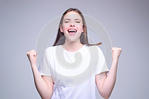 Portrait of excited woman. Wow, omg. Excited girl opening mouth widely. Woman with excited amazed expression face