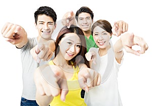 Portrait of excited young student people pointing at you