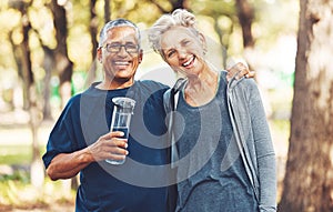 Portrait, exercise and senior couple with water bottle for training, workout and park. Mature man, old woman and