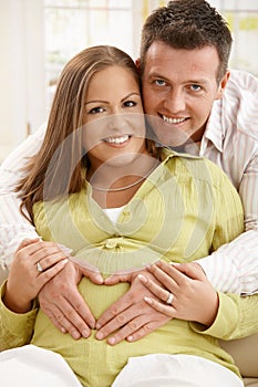 Portrait of expecting couple