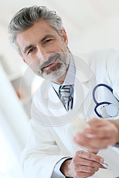 Portrait of experienced doctor