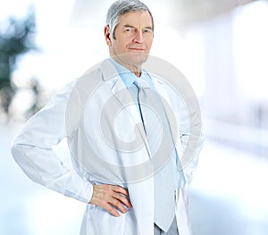 Portrait of an experienced physician consultant on blurred background