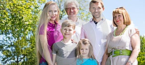 Portrait of extended family in park