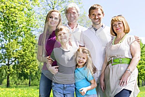 Portrait of extended family in park