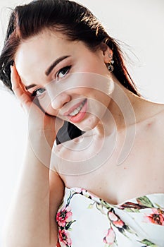 portrait face beautiful brunette woman in summer dress with flowers