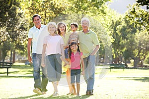 Portrait Of Family Enjoying Walk In